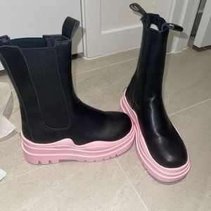 Black & pink tire boots.